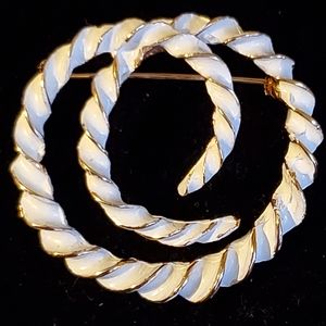 Jonette Jewelry goldtone and white swirl brooch